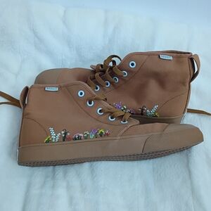 Bang Tan High-Top Sneakers with Floral Embroidery.